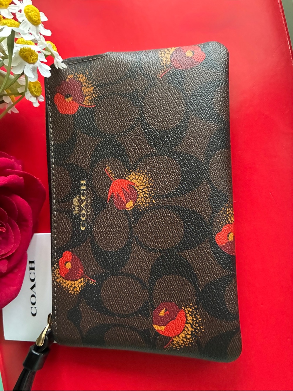 Coach Brown Signature Wristlet with Red and Orange Floral Accents